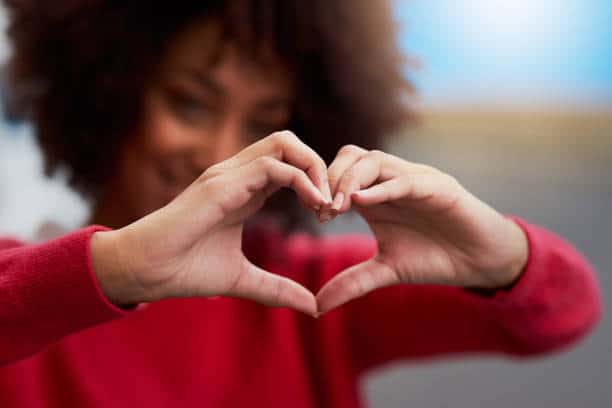 Cropped shot of an unrecognizable woman forming a heart shape with her fingers. Test To Find Out If You Love Yourself